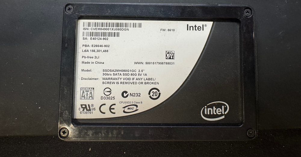 Intel X25-M 80 GB 2.5-inch SATA SSD in a black plastic spacer frame